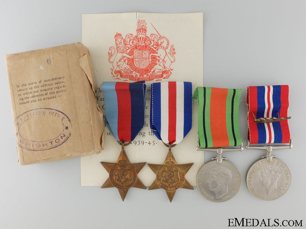 wwii_british_group_of_four_medals_with_shipping_container_wwii_british_gro_535bec70803a8