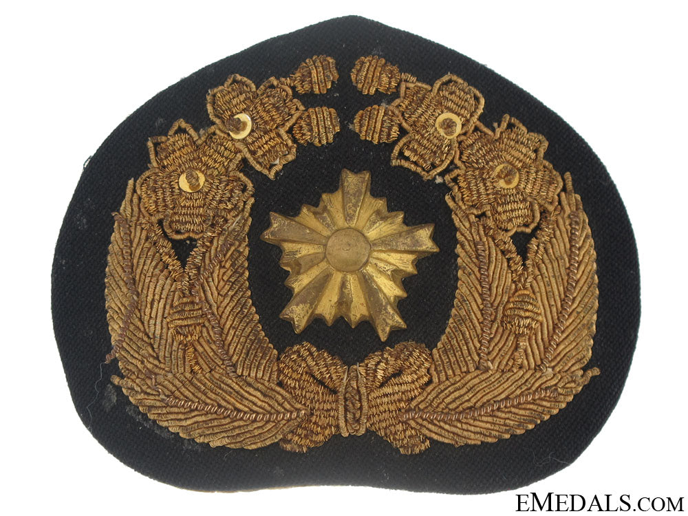 wwii_navy_officer’s_cap_badge_wwii_navy_office_504f8a150d0a9