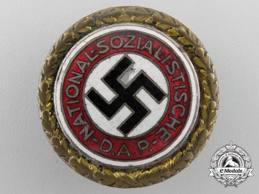 a_large_nsdap_golden_party_badge,_numbered_y_900
