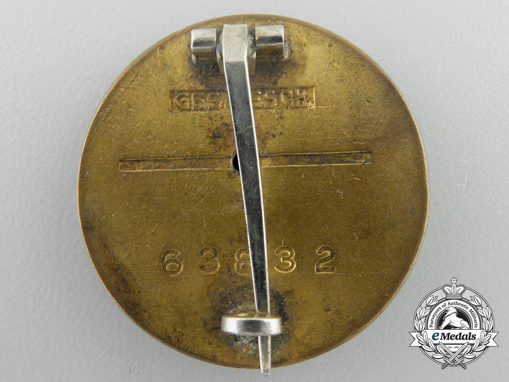 a_large_nsdap_golden_party_badge,_numbered_y_901