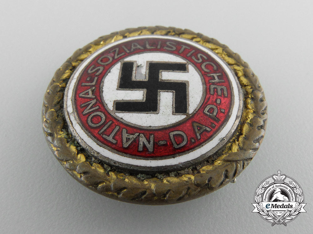 a_large_nsdap_golden_party_badge,_numbered_y_903