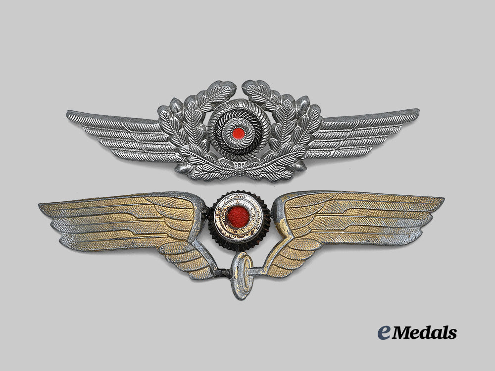 germany,_third_reich._a_pair_of_visor_cap_cockades,_luftwaffe_and_reichsbahn_issue_e_medals__g62663_2