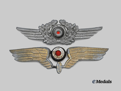 germany,_third_reich._a_pair_of_visor_cap_cockades,_luftwaffe_and_reichsbahn_issue_e_medals__g62663_2