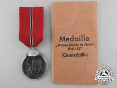 A Mint Second War German East Medal 1941/42 With Packet Of Issue