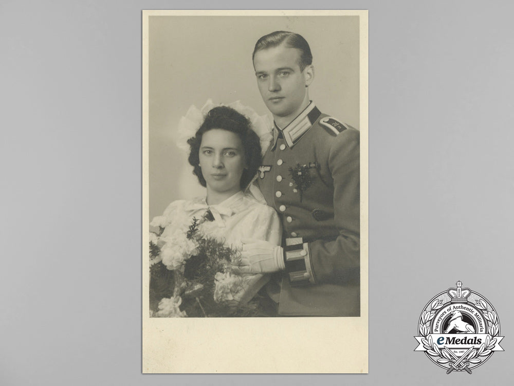 a_wartime_studio_wedding_photo_of_an_nco_with_sudetenland_medal&_prague_bar_zz_1704_1__3